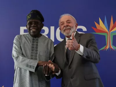 Brazilian President Luiz Inacio Lula da Silva, right, flashes a thumbs up while receiving Nigerian President Bola Tinubu for their bilateral meeting ahead of the upcoming 17th annual BRICS summit, in Rio de Janeiro, Saturday, July 5, 2025. (AP Photo/Bruna Prado)