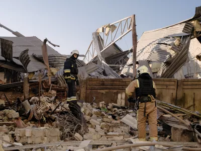 07 July 2025, Ukraine, Kharkiv: First responders inspect the destruction after Russia attacked Kharkiv, the second-largest city in Ukraine, using strike drones. Photo: Patrick Muzart/ZUMA Press Wire/dpa