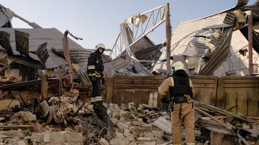 07 July 2025, Ukraine, Kharkiv: First responders inspect the destruction after Russia attacked Kharkiv, the second-largest city in Ukraine, using strike drones. Photo: Patrick Muzart/ZUMA Press Wire/dpa
