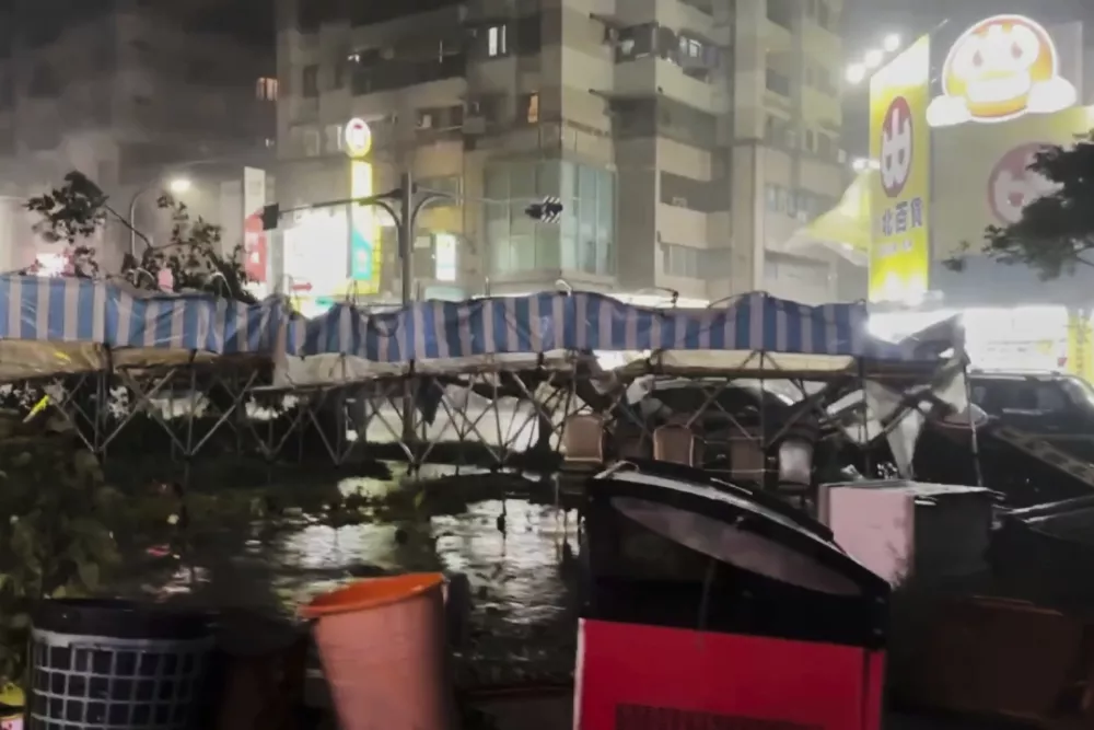 This image made from a video provided by TVBS shows a damaged market stalls following the Typhoon Danas landed in Tainan, Taiwan on Sunday, July 6, 2025. (TVBS via AP)
