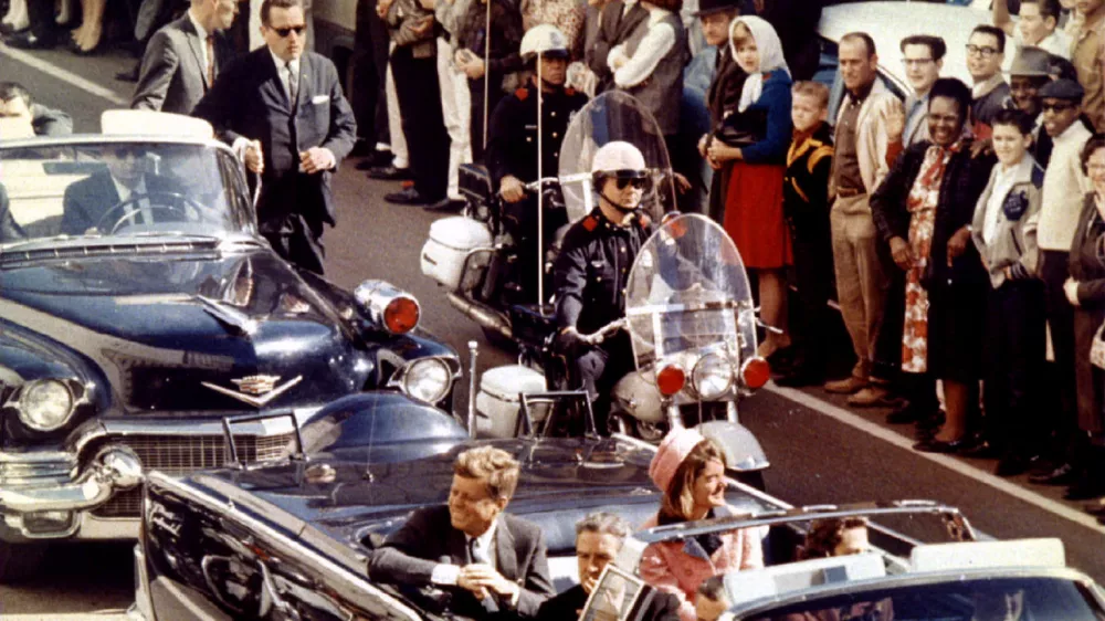 FILE PHOTO: November 22, 1993 will mark the 30th anniversary of the assassination of President John F. Kennedy. President and Mrs. John F. Kennedy, and Texas Governor John Connally ride through Dallas moments before Kennedy was assassinated, November 22, 1963/File Photo