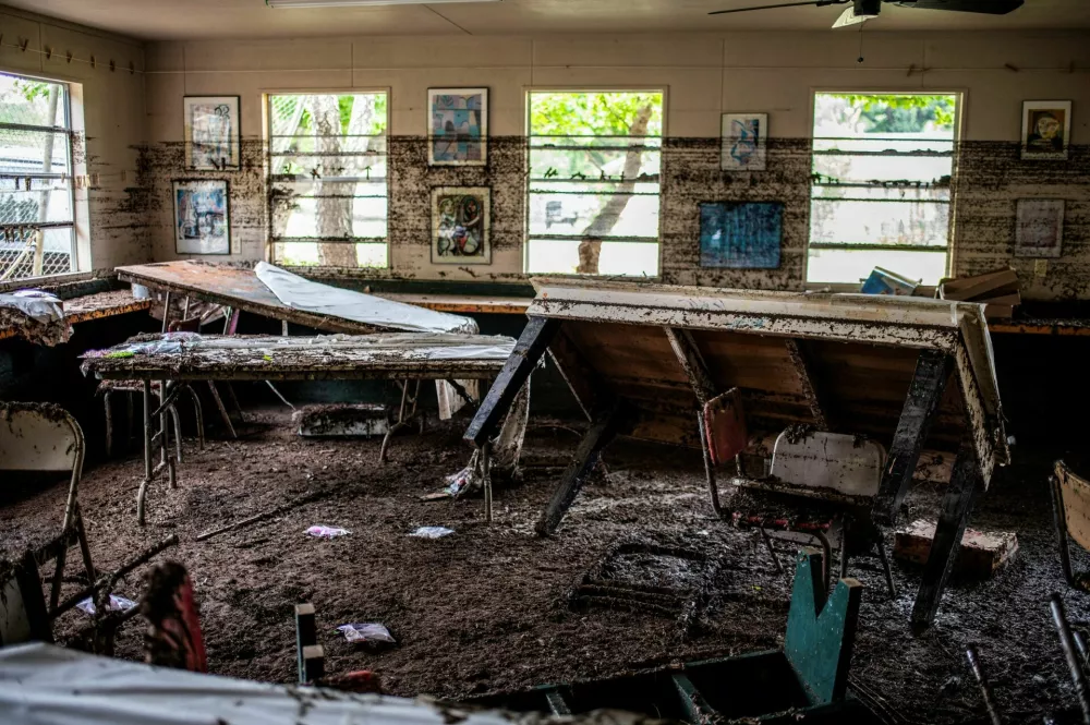 Damaged items lie inside of a cabin at Camp Mystic, in the aftermath of deadly flooding in Kerr County, Texas, U.S., July 7, 2025.  REUTERS/Sergio Flores