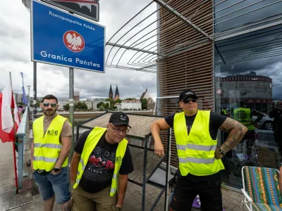 Members of a far-right movement 'Border Defense Movement' (ROG) hold a post as an unofficial "citizens' patrol" at the Polish-German border in Slubice, western Poland, close to the German city of Frankfurt an der Oder, on July 7, 2025, as Poland temporarily reintroduced border controls with Germany and Lithuania, saying they are needed to control "illegal immigration". In total, 52 checkpoints have been set up on the border with Germany and 13 with Lithuania, the Polish interior minister said. The controls will last from 7 July to 5 August 2025 but could be extended. They will mostly consist of spot inspections, particularly of vehicles carrying several people, Polish officials said.,Image: 1019329707, License: Rights-managed, Restrictions:, Model Release: noFoto: Profimedia