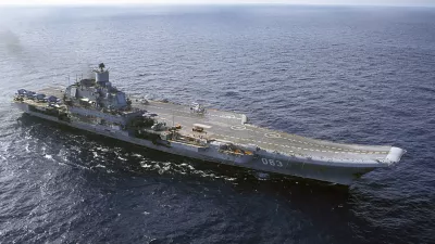 ﻿FILE - In this 2004 file photo the Admiral Kuznetsov carrier seen in the Barents Sea, Russia. The Russian military says one of its the MiG-29 fighter jets based at a Russian aircraft carrier currently near Syria's shores has crashed on a training mission, but its pilot has survived. (AP Photo, File)