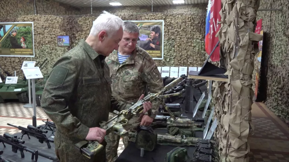 Russian Defence Minister Andrei Belousov holds a machine gun during his visit to the command centre of the "Dnepr" troops, amid Russia's attack on Ukraine, in an undisclosed location, in this screengrab taken from handout footage released July 11, 2025. Russian Defence Ministry/Handout via REUTERS ATTENTION EDITORS - THIS IMAGE HAS BEEN SUPPLIED BY A THIRD PARTY. NO RESALES. NO ARCHIVES. MANDATORY CREDIT.