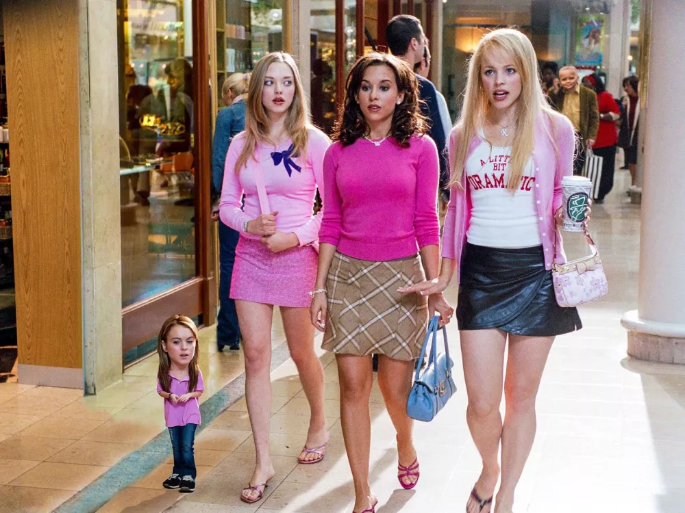 Story from Jam Press (Mini Movies)Pictured: Mean Girls. Artist turns celebs into hilarious pint-sized movie stars – and Dua Lipa's a fanMonterrey-based content creator Oscar Hinojosa has a very particular set of skills — the kind that involves making movie heroes small enough to fit in your pocket. Using nothing but Photoshop, a well-timed brownie, and the brainchild of one very tiny dog, Oscar has carved out a delightfully odd digital niche: creating "mini celebrities" from film, sport, and pop culture.His inspiration? A pint-sized pup and a weekend experiment with a "special brownie." Oscar recalls staring at his miniature mutt and thinking, "What would I look like if I were that tiny?" One Photoshop session later, he had his answer. Since then, he's miniaturized everyone from Michael J. Fox in Back to the Future to a shrunken Will Smith fending off miniature monsters in I Am Legend. "It's nostalgic and fun," he says."As long as people keep enjoying it, I'll keep creating." And enjoy it, they do. Oscar's micro-makeovers of Gladiator's Russell Crowe wielding a thimble-sized sword, or Cillian Murphy brooding in a baby Peaky Blinders cap, have earned him thousands of likes and a few celebrity reposts. Finneas (Billie Eilish's brother) is a serial sharer, and Oscar suspects he might be using the mini edits to tease his sister. Meanwhile, Dua Lipa gave one of his posts her stamp of approval — a moment he describes as "surreal."Each piece takes about 30 minutes now (down from an hour), all crafted manually with Adobe Photoshop — no AI, just old-school YouTube learning. While some edits are a breeze, like a tiny Kevin from Home Alone defending his micro-house, others like his tennis-themed pieces or Cristiano Ronaldo lifting a mouse-sized trophy take time and a perfect shot. And what's the most common reaction? "People love it when I mini someone who's already short. I get comments like, 'Where's the edit?'" Oscar laughs. With over 30,000 likes on some posts and a global fanbase, Oscar (also known as Phetru) proves that no dream is too small — literally.ENDS,Image: 1020791296, License: Rights-managed, Restrictions:, Model Release: no