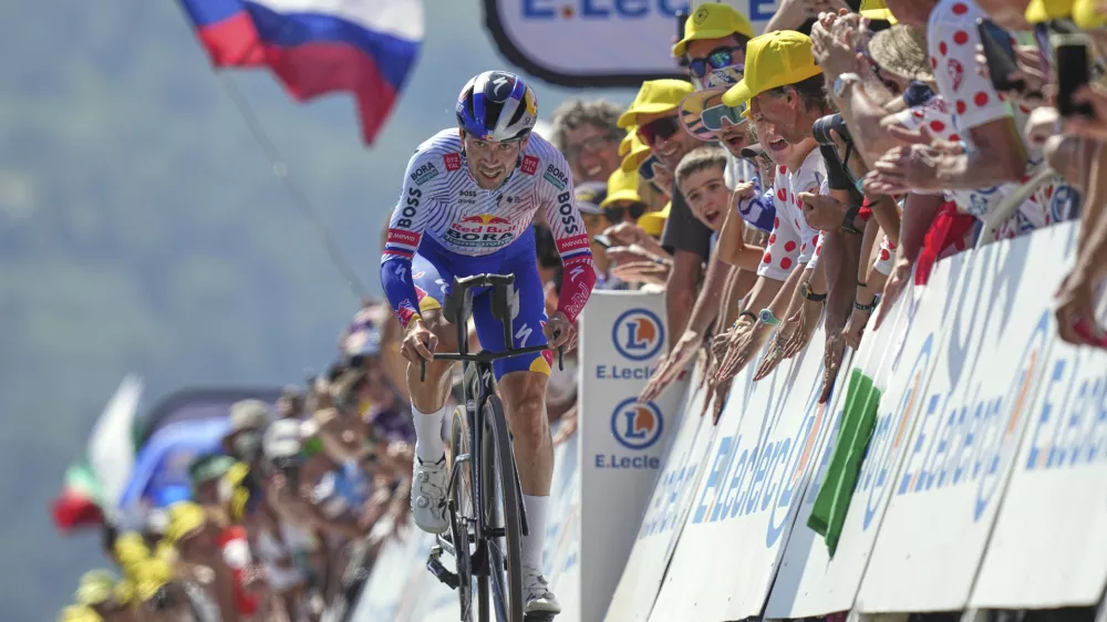 Slovenia's Primoz Roglic climbs during the thirteenth stage of the Tour de France cycling race, an individual time-trial over 10.5 kilometers (6.5 miles) in the Pyrenees mountains with start in Loudenvielle and finish in Peyragudes, France, Friday, July 18, 2025. (AP Photo/Thibault Camus)