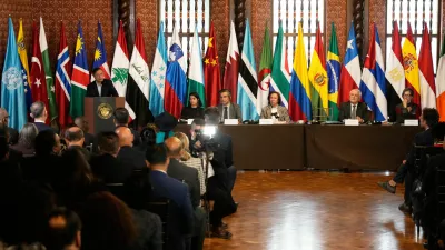 Colombia's President Gustavo Petro, left, delivers a speech during a two-day conference on the Israel-Hamas war and Israel's military actions in Gaza, in Bogota, Colombia, Wednesday, July 16, 2025. (AP Photo/Fernando Vergara)