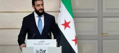 FILE PHOTO: Syrian President Ahmed al-Sharaa speaks during a joint press conference with French President Emmanuel Macron after a meeting at the Elysee Palace in Paris, France, May 7, 2025. REUTERS/Stephanie Lecocq/Pool/File Photo