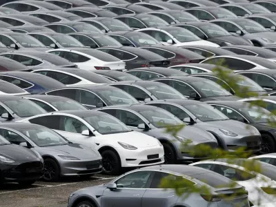 FILE PHOTO: Tesla electric vehicles are pictured at one of the company's delivery centers in Valenton, near Paris, France, April 24, 2025. REUTERS/Benoit Tessier/File Photo