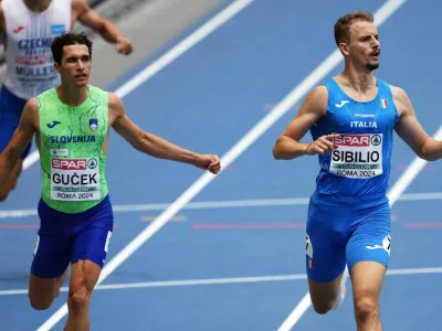 Athletics - European Athletics Championships - Stadio Olimpico, Rome, Italy - June 10, 2024 Slovenia's Matic Ian Gucek and Italy's Alessandro Sibilio during the men's 400m hurdles semi final REUTERS/Aleksandra Szmigiel
