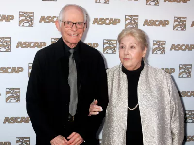 FILE PHOTO: Oscar winning songwriters Alan and Marilyn Bergman arrive at the 26th annual ASCAP Pop Music Awards in Hollywood, California April 22, 2009. REUTERS/Fred Prouser/File Photo