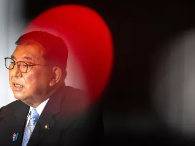 Japan's Prime Minister Shigeru Ishiba attends a press conference at the headquarters of the Liberal Democratic Party (LDP) in Tokyo Monday, July 21, 2025 after the prime minister's ruling coalition failed to secure a majority in the upper house in a parliamentary election. (Philip Fong/Pool Photo via AP) 