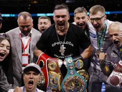 Boxing - Oleksandr Usyk v Daniel Dubois - Undisputed World Heavyweight Title - BoxPark Wembley, London, Britain - July 19, 2025 Oleksandr Usyk celebrates winning his fight against Daniel Dubois Action Images via Reuters/Andrew Couldridge