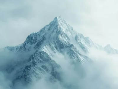 A towering mountain peak rises above the clouds, covered in snow and enveloped by morning mist.,Image: 950517957, License: Royalty-free, Restrictions:, Model Release: noFoto: Profimedia