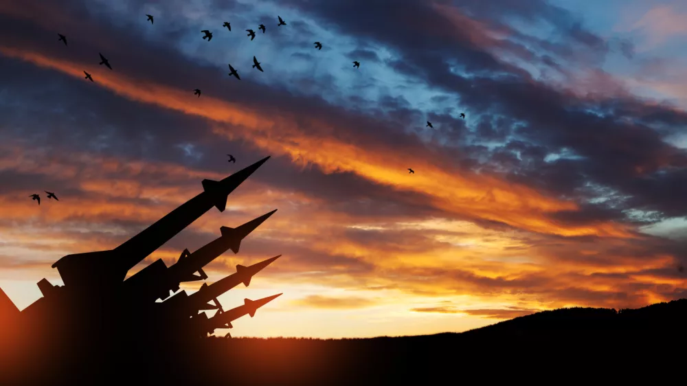 The missiles are aimed at the sky at sunset. Nuclear bomb, chemical weapons, missile defense, a system of salvo fire.