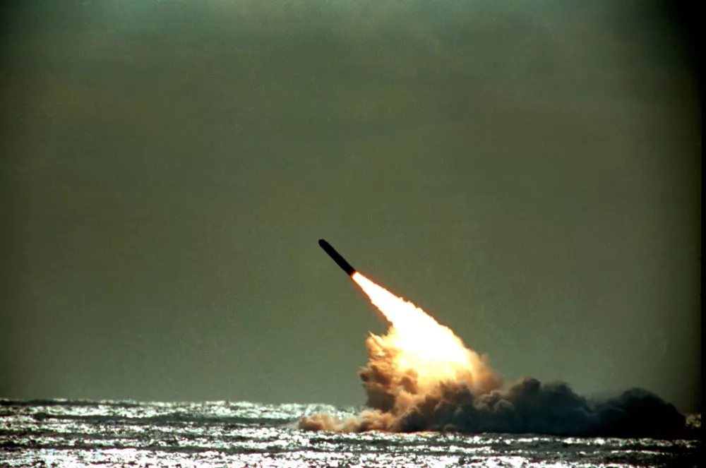FILE - The Dec. 4, 1989 file photo shows U.S. Navy launching a Trident II, D-5 missile from the submerged submarine USS Tennessee in the Atlantic Ocean off the coast of Florida. Pushing his vision of a nuclear weapons-free world, President Barack Obama returned to Prague on Thursday, April 8, 2010 to sign a pivotal treaty aimed at sharply paring U.S. and Russian arsenals ? and repairing soured relations between the nations. With that, they will commit their nations to slash the number of strategic nuclear warheads by one-third and more than halve the number of missiles, submarines and bombers carrying them, pending ratification by their legislatures. The new treaty will shrink those warheads to 1,550 over seven years. That still allows for mutual destruction several times over. But it will send a strong signal that Russia and the U.S., which between them own more than 90 percent of the world's nuclear weapons, are serious about disarmament. (AP Photo/Phil Sandlin, File)