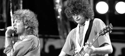 ﻿FILE - In this July 13, 1985 file photo, singer Robert Plant, left, and guitarist Jimmy Page of the British rock band Led Zeppelin perform at the Live Aid concert at Philadelphia's J.F.K. Stadium. Generations of aspiring guitarists have tried to copy the riff from Led Zeppelin's â€śStairway to Heaven.â€ť Starting Tuesday, June 14, 2016, a Los Angeles court will try to decide whether the members of Led Zeppelin themselves ripped off that riff. Page and Plant are named as defendants in the lawsuit brought by the trustee of late guitarist Randy Wolfe from the band Spirit. (AP Photo/Rusty Kennedy, File)