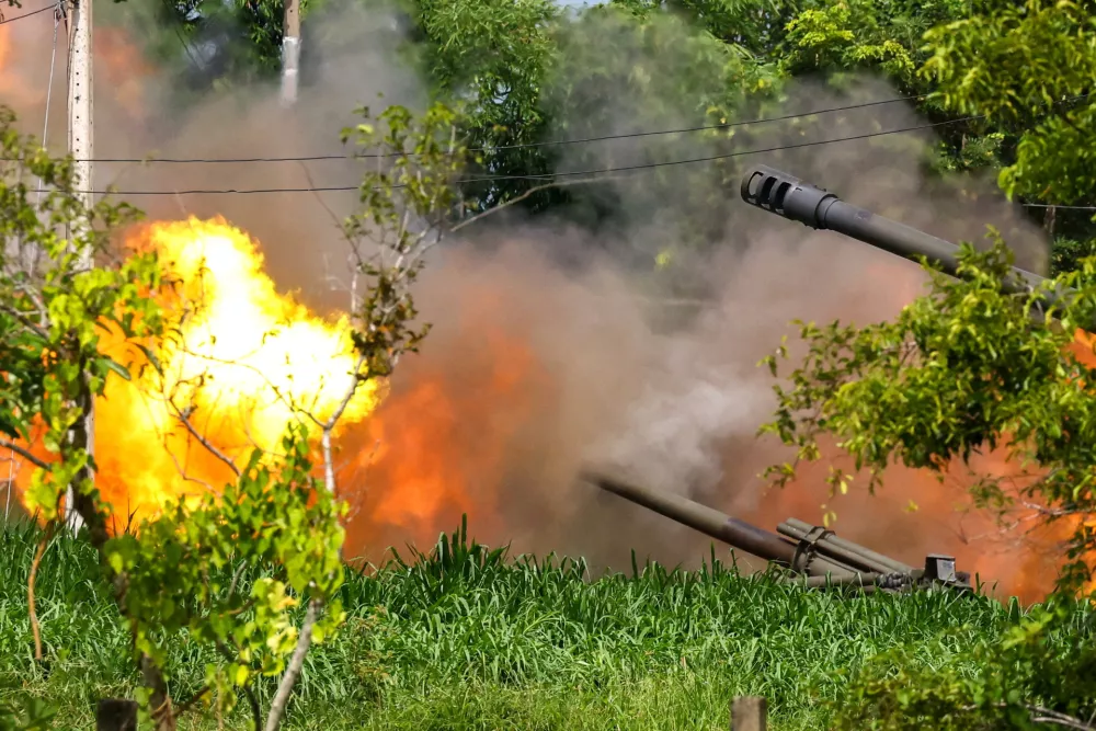 A Thai military mobile unit fires towards Cambodia's side after Thailand and Cambodia exchanged heavy artillery on Friday as their worst fighting in more than a decade stretched for a second day, in Surin, Thailand, July 25, 2025. REUTERS/Athit Perawongmetha