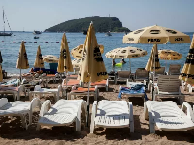 A view shows beach beds for tourists in Slovenska plaza, as Montenegro is hit by an intense heatwave, with soaring temperatures pushing many to escape to the coast, in Budva, Montenegro, July 22, 2025. REUTERS/Stevo Vasiljevic