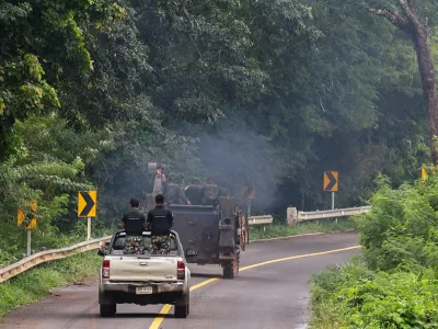 Military vehicles are seen in Sisaket province, as Cambodia and Thailand each said the other had launched artillery attacks across contested border areas early on Sunday, hours after U.S. President Donald Trump said the leaders of both countries had agreed to work on a ceasefire, Thailand, July 27, 2025. REUTERS/Athit Perawongmetha