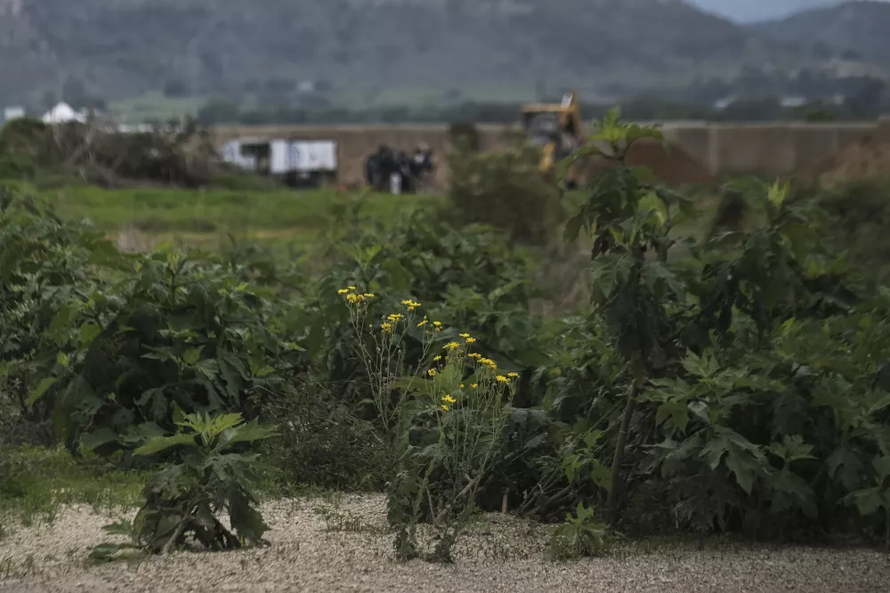 A view of a Nextipac ranch where prosecutors say bodies were discovered in a mass grave during excavations, in the Zapopan municipality, Jalisco state, Mexico, Friday, July 11, 2025. (AP Photo/Alejandra Leyva)