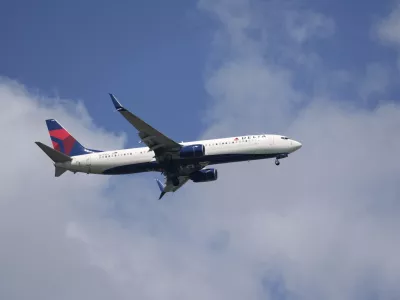 FILE - A Delta Airlines plane lands at Sarasota-Bradenton International Airport Friday, March 28, 2025. (AP Photo/Gene J. Puskar, File)