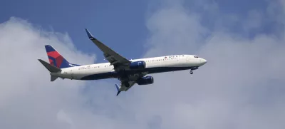 FILE - A Delta Airlines plane lands at Sarasota-Bradenton International Airport Friday, March 28, 2025. (AP Photo/Gene J. Puskar, File)