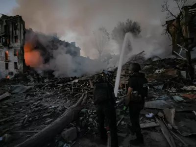 Firefighters work at the site of an apartment building hit by a Russian military strike, amid Russia's attack on Ukraine, in Donetsk Region, in the city of Kramatorsk, Ukraine July 31, 2025. REUTERS/Yevhen Titov   TPX IMAGES OF THE DAY