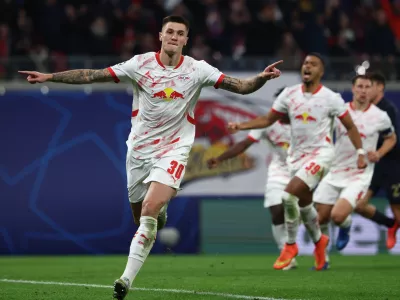 02 October 2024, Saxony, Leipzig: Leipzig's Benjamin Sesko celebrates scoring his side's second goal during the UEFA Champions League soccer match between RB Leipzig and Juventus at the Red Bull Arena. Photo: Jan Woitas/dpa