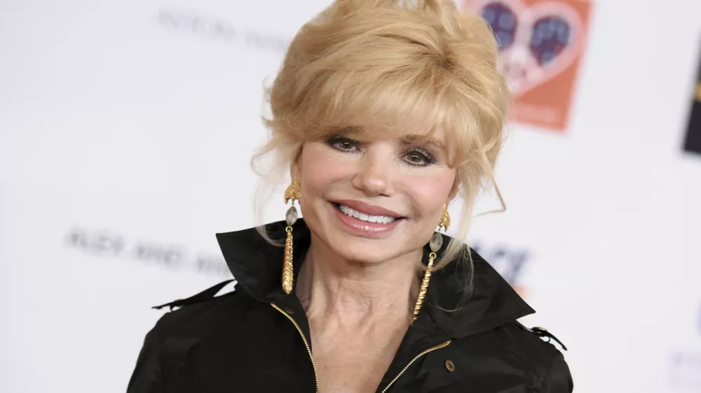 FILE - Loni Anderson arrives at the 22nd Annual Race To Erase MS Event held at the Hyatt Regency Century Plaza Hotel, Friday, April 24, 2015, in Los Angeles. (Photo by Richard Shotwell/Invision/AP, File)