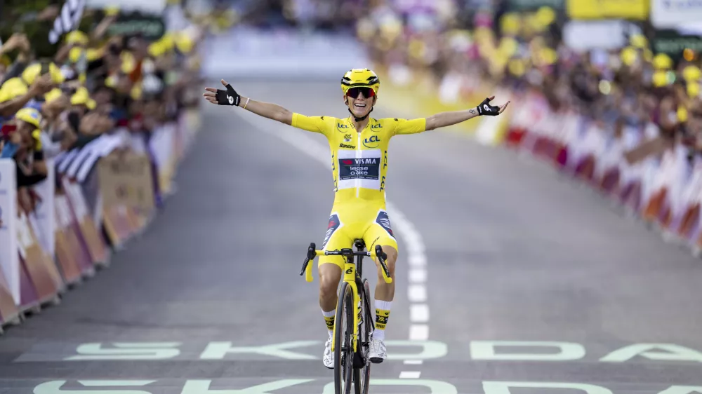 The winner of the Tour de France Femmes Pauline Ferrand-Prevot from France of team Visma - Lease a Bike celebrates as she crosses the finish line to win the 9th stage of the 4th edition of the Women's Tour de France cycling race, 124,1 km from Praz-Sur-Arly to Chatel Les Portes du Soleil, in Chatel, France, Sunday Aug. 3, 2025. (Jean-Christophe Bott/Keystone via AP)
