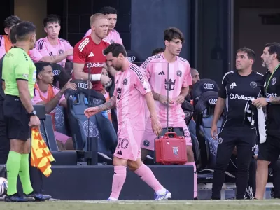 Inter Miami forward Lionel Messi (10) walks off the pitch after leaving the game during the first half of a Leagues Cup soccer match against Necaxa, Saturday, Aug. 2, 2025, in Fort Lauderdale, Fla. (AP Photo/Rebecca Blackwell)