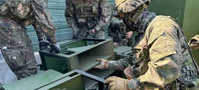 FILE PHOTO: South Korean soldiers work on a loudspeaker that is set up for propaganda broadcasts during a military drill near the demilitarized zone separating the two Koreas in Paju, South Korea, in this handout picture provided by the Defense Ministry and released on June 9, 2024.  The Defense Ministry/Handout via REUTERS  ATTENTION EDITORS - THIS IMAGE HAS BEEN SUPPLIED BY A THIRD PARTY./File Photo