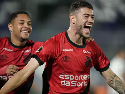 FILE - Romûlo of Brazil's Athletico Paranaense, right, celebrates scoring his side's opening goal against Paraguay's Libertad during a Copa Libertadores Group G soccer match at Defensores del Chaco stadium in Asuncion, Paraguay, Thursday, May 4, 2023. (AP Photo/Jorge Saenz, file)