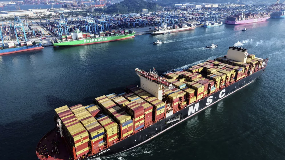 A MSC container ship sails off from a container terminal, in Qingdao in east China's Shandong province on July 25, 2025. (Chinatopix Via AP)