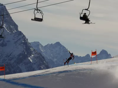 United States' Mikaela Shiffrin speeds down the course during an alpine ski, women's World Cup downhill training, in Cortina d'Ampezzo, Italy, Wednesday, Jan. 24, 2024. (AP Photo/Alessandro Trovati)