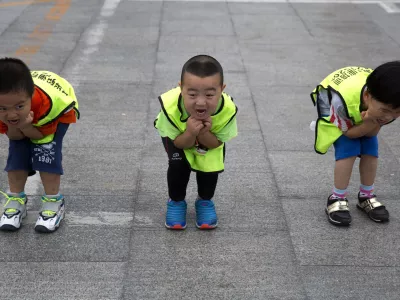 ﻿Children practice their postures during a roller blading class outside a park in Beijing, China, Wednesday, June 24, 2015. Roller blading has grown in popularity as instructors and equipment become more easily available in the Chinese capital.  (AP Photo/Ng Han Guan)