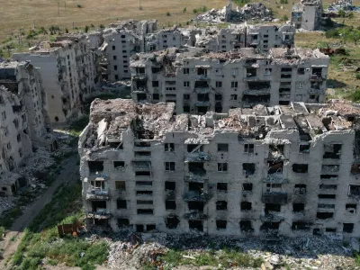 A drone view shows the ruins of residential buildings in the abandoned town of Marinka (Maryinka), which was destroyed in the course of Russia-Ukraine conflict in the Donetsk region, a Russian-controlled area of Ukraine, August 7, 2025. REUTERS/Alexander Ermochenko