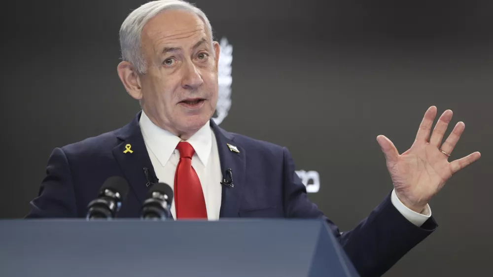 Israeli Prime Minister Benjamin Netanyahu speaks during a press conference at the Prime minister's office in Jerusalem, Sunday, Aug. 10, 2025. (Abir Sultan/Pool Photo via AP)