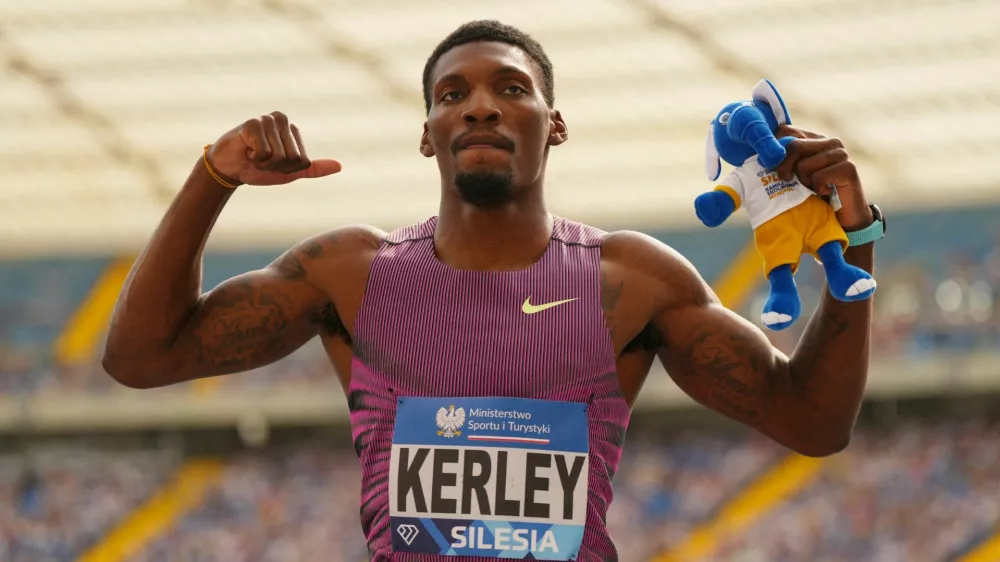 FILE PHOTO: Athletics - Diamond League - Silesia - Silesian Stadium, Chorzow, Poland - August 25, 2024 Fred Kerley of the U.S. celebrates after winning the men's 100m REUTERS/Aleksandra Szmigiel/File Photo