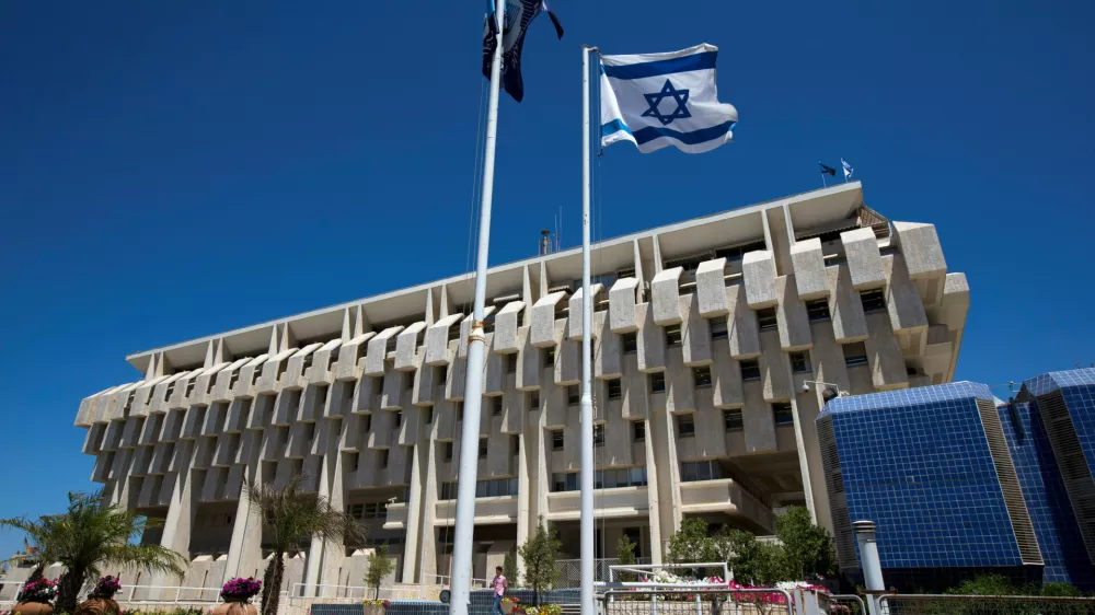 ﻿FILE PHOTO - An Israeli flag flutters outside the Bank of Israel building in Jerusalem August 7, 2013.  REUTERS/Ronen Zvulun/File Photo          GLOBAL BUSINESS WEEK AHEAD PACKAGE - SEARCH BUSINESS WEEK AHEAD 23 JANUARY FOR ALL IMAGES