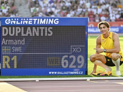 Armand Duplantis, of Sweden celebrates his victory and world record in the final of the men's pole vault at the 15th Gyulai Istvan Memorial Track and Field Hungarian Grand Prix in the National Athletics Center in Budapest, Hungary, Tuesday, Aug. 12, 2025. (Tamas Vasvari/MTI via AP)