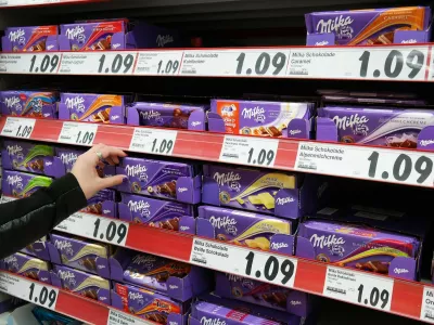 GERMANY - FEBRUARY 2015: Shelves with a variety of Milka chocolate bars in a Kaufland supermarket. Milka is a traditional Swiss brand of chocolate confection, since 1990 manufactured by US-american Mondelēz International,Image: 228895946, License: Rights-managed, Restrictions: Usage restrictions: Advertising and promotion,Commercial electronic,Consumer goods,Direct mail and brochures,Indoor display,Internal business usage,Personal use, Model Release: no