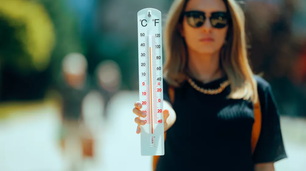 Hot day raising degrees in the thermometers and unhealthy discomfort
