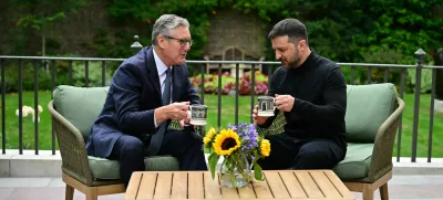 Britain's Prime Minister Keir Starmer, left, talks with Ukraine's President Volodymyr Zelenskyy in the garden of 10 Downing Street in London, Thursday Aug. 14, 2025. (Ben Stansall/Pool Photo via AP)