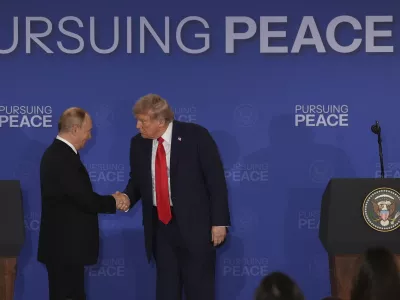 President Donald Trump, right, shakes the hand of Russia's President Vladimir Putin during a joint press conference at Joint Base Elmendorf-Richardson, Alaska, Friday, Aug. 15, 2025. (AP Photo/Jae C. Hong)