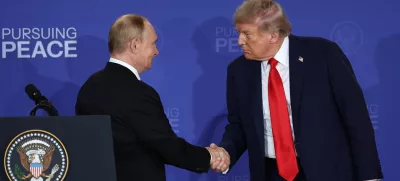 HANDOUT - 15 August 2025, US, Alaska: US President Donald Trump (R) and Russian President Vladimir Putin shake hands after a press conference at Joint Base Elmendorf-Richardson in Alaska. Photo: -/Kremlin/dpa - ATTENTION: editorial use only and only if the credit mentioned above is referenced in full