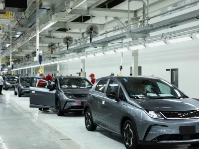 FILE PHOTO: Workers check the EV cars inside BYD's first electric vehicle (EV) factory in Southeast Asia, a fast-growing regional EV market where it has become the dominant player, in Rayong, Thailand, July 4, 2024. REUTERS/Chalinee Thirasupa/File Photo