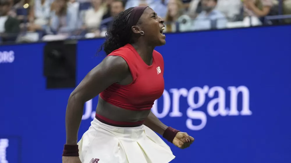 Coco Gauff, of the United States, celebrates winning a match agains Ajla Tomljanovic, of Australia, during the first round of the U.S. Open tennis championships, Tuesday, Aug. 26, 2025, in New York. (AP Photo/Frank Franklin II)
